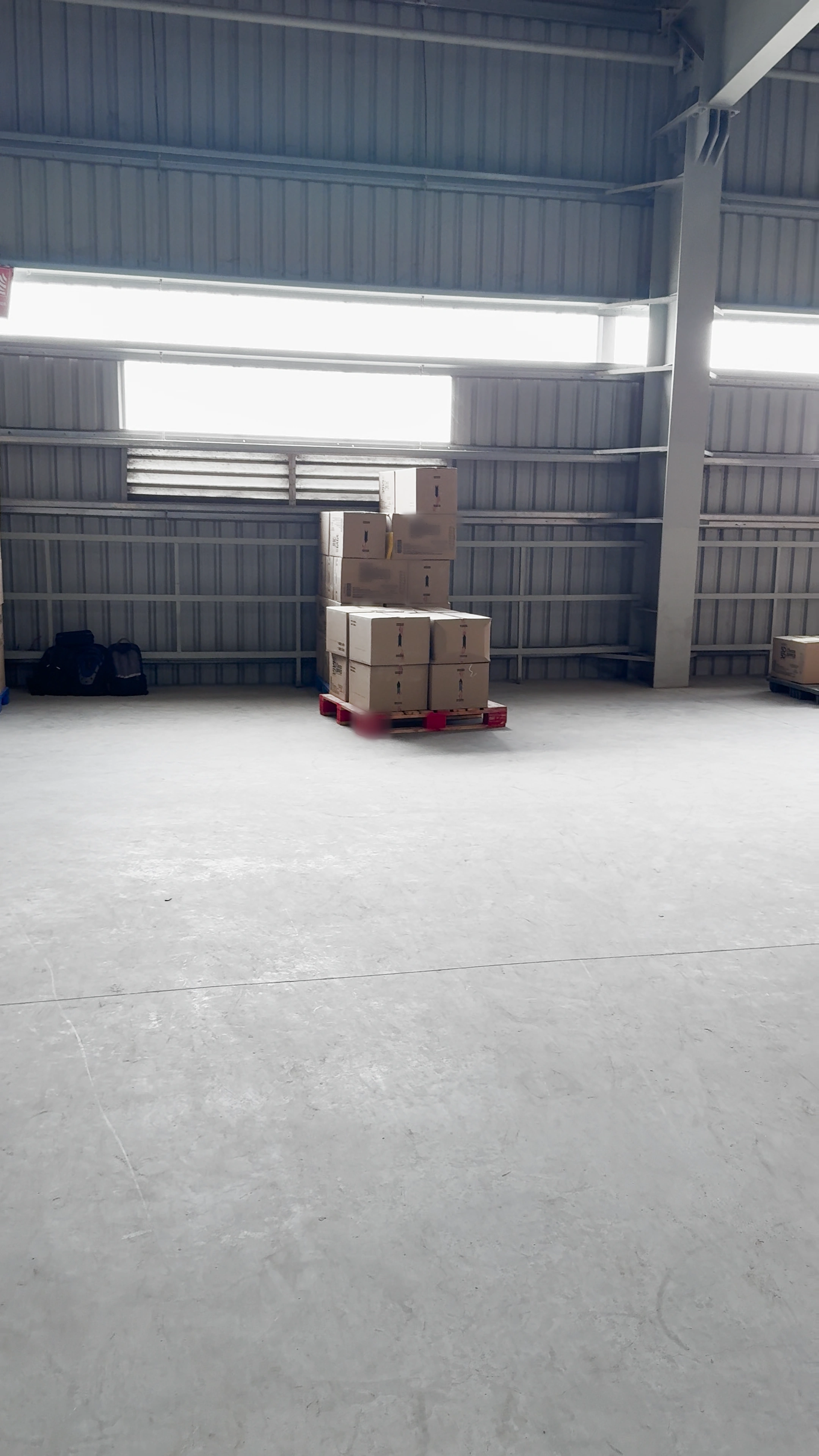 Real iPhone capture of the warehouse storage bay