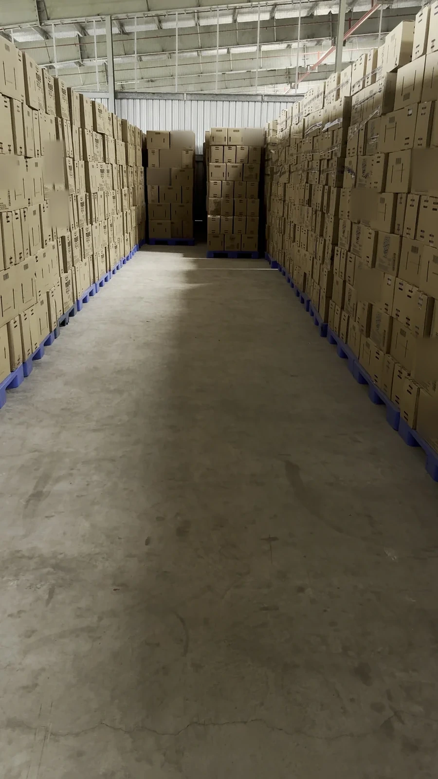 Real iPhone view 3 of the same warehouse aisle